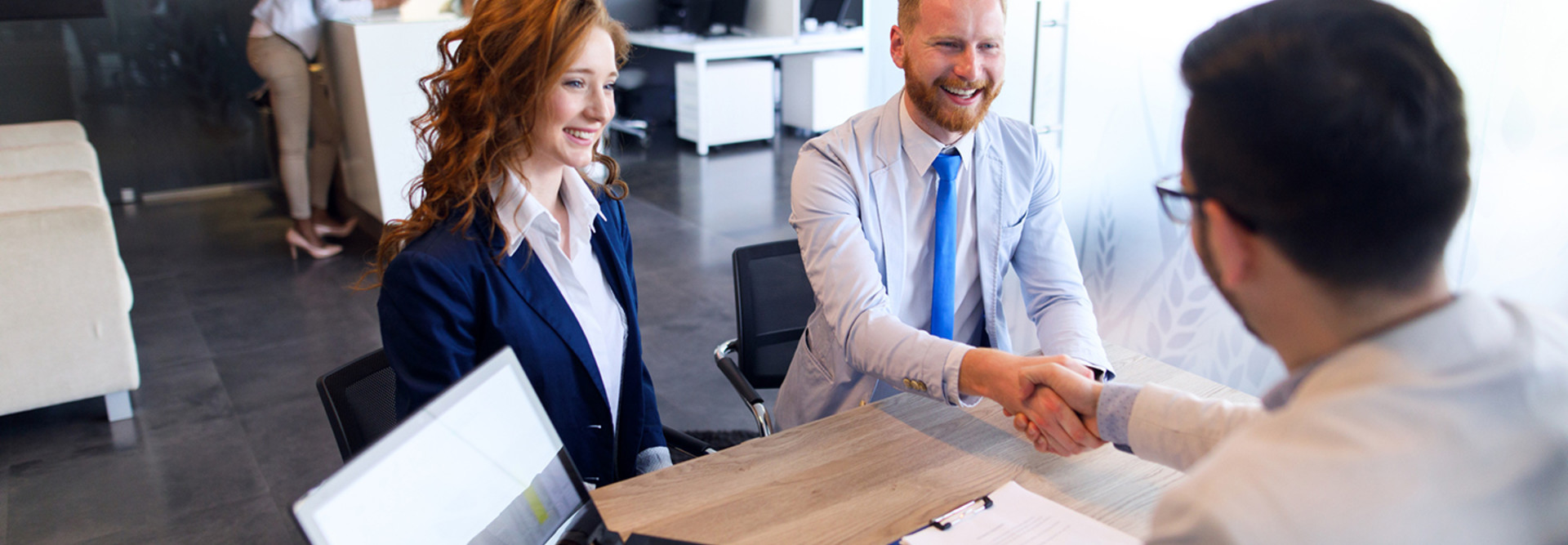 man and woman getting a loan 