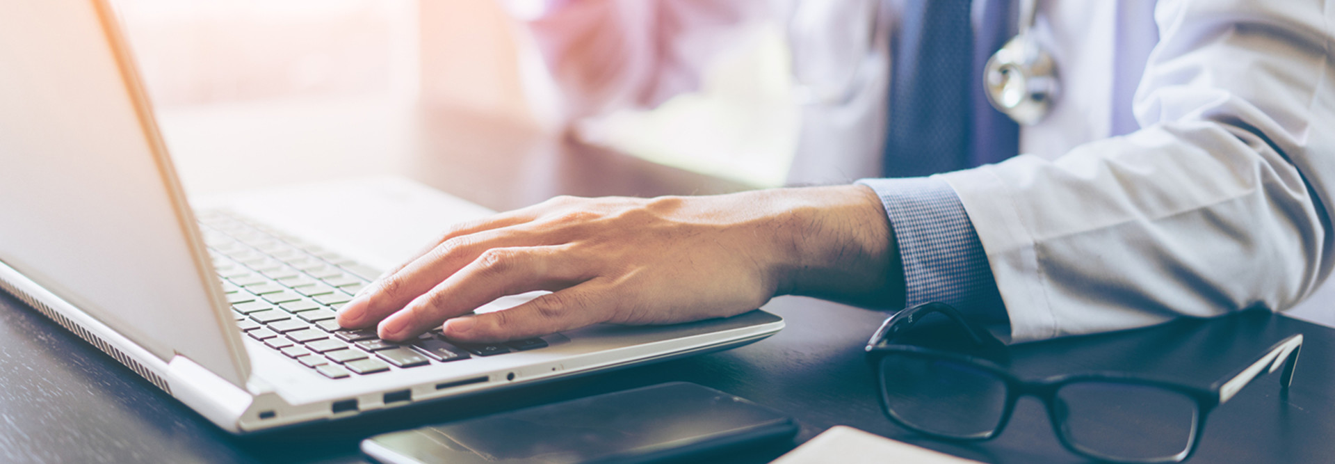 Clinician using technology 