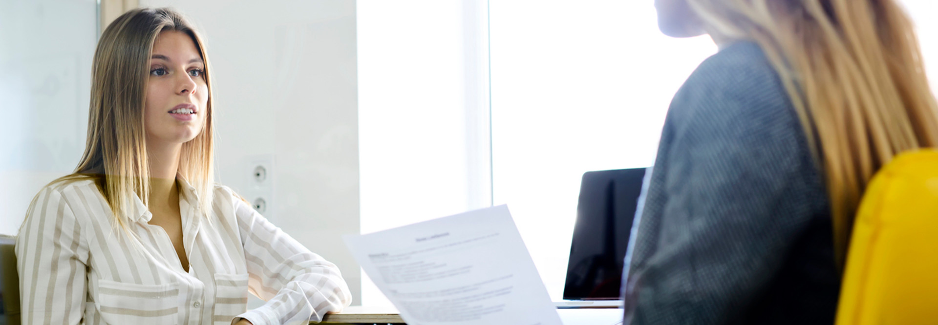 Woman in a job interview for a freelance gig at a nonprofit 