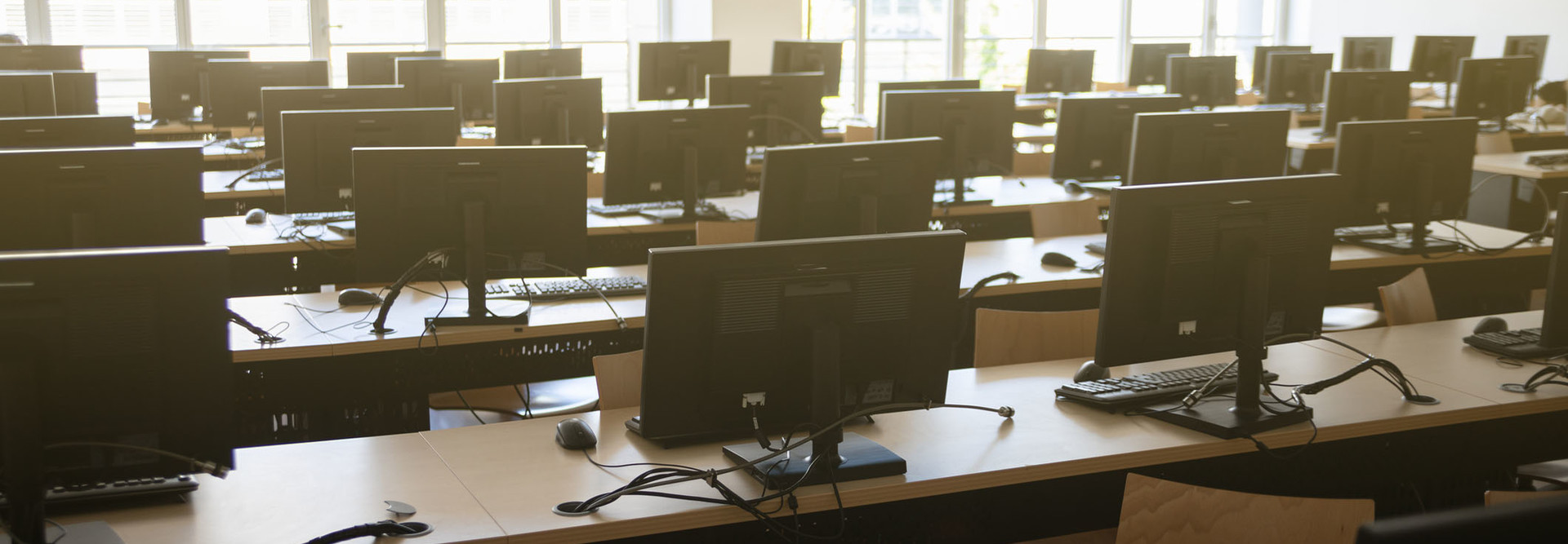 Classroom of many desktop computers.