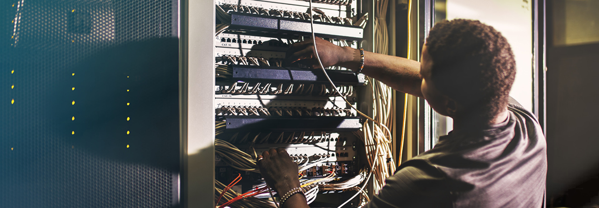 IT guy fixing data center