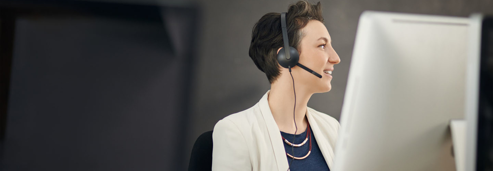Shot of a young call center agent working in an office
