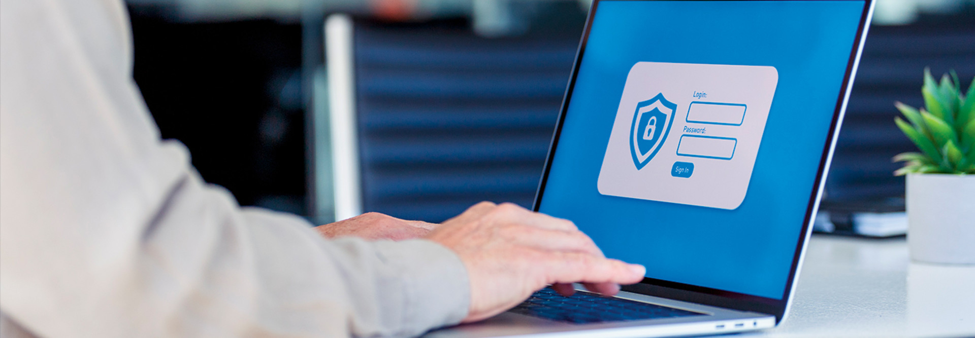 Man logging onto password protected computer