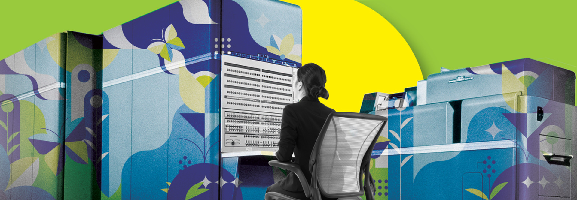Person working at vintage mainframe