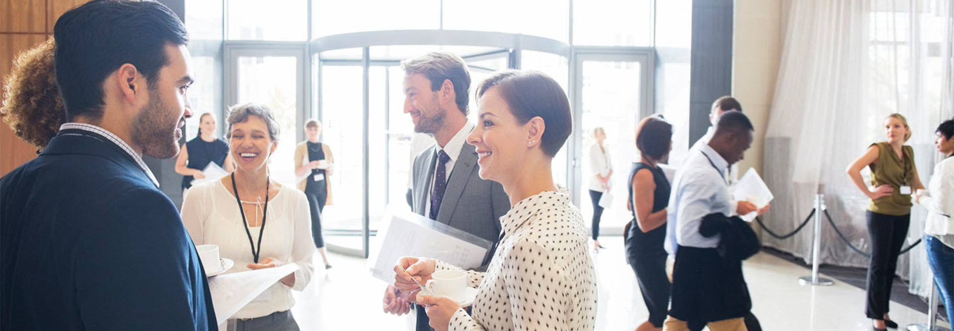 People networking at a conference