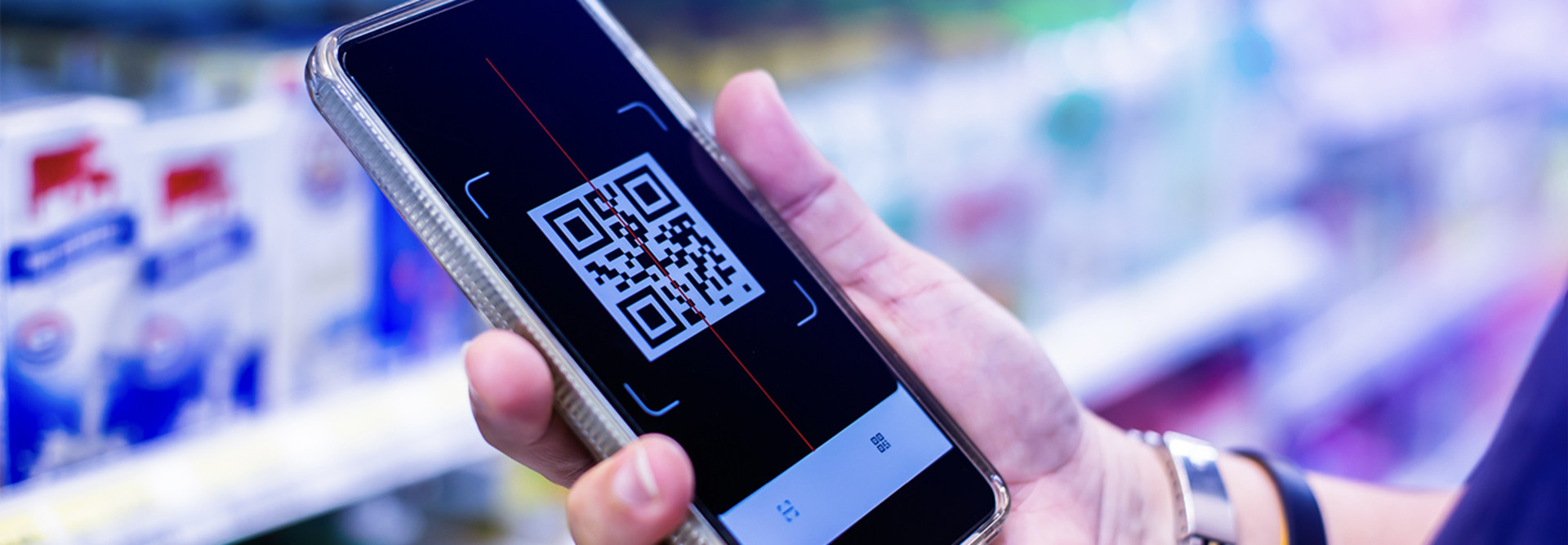 Person scanning QR code