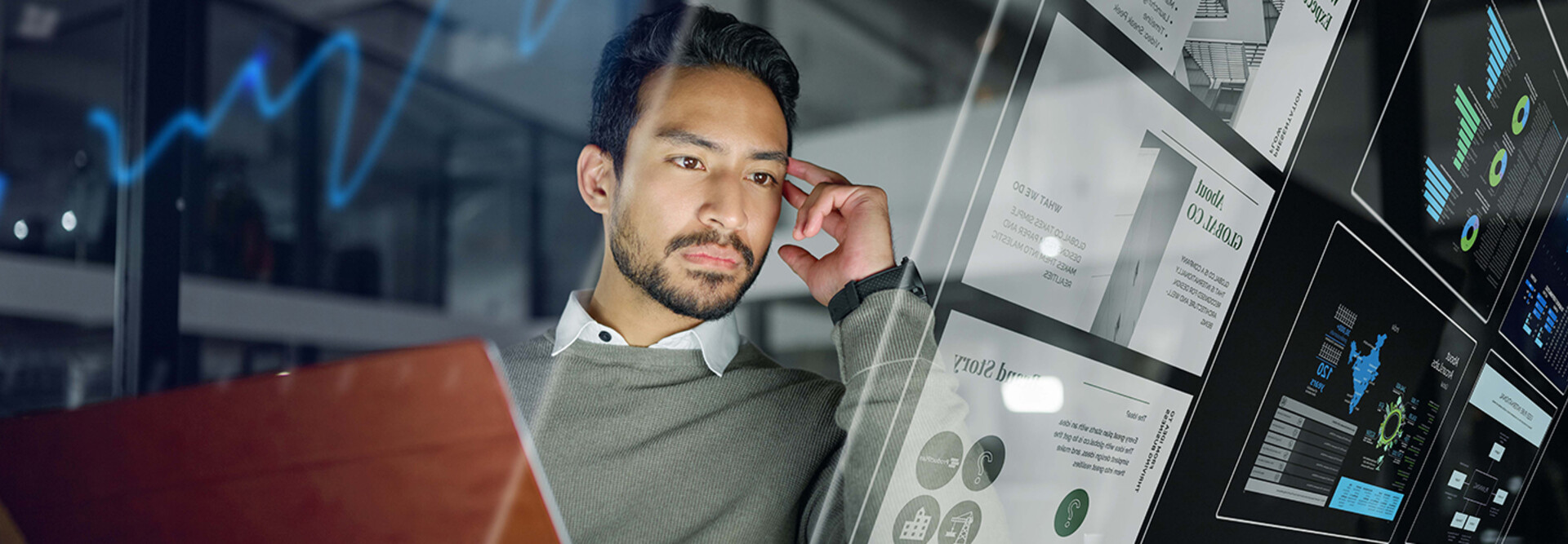 Man with computer monitors