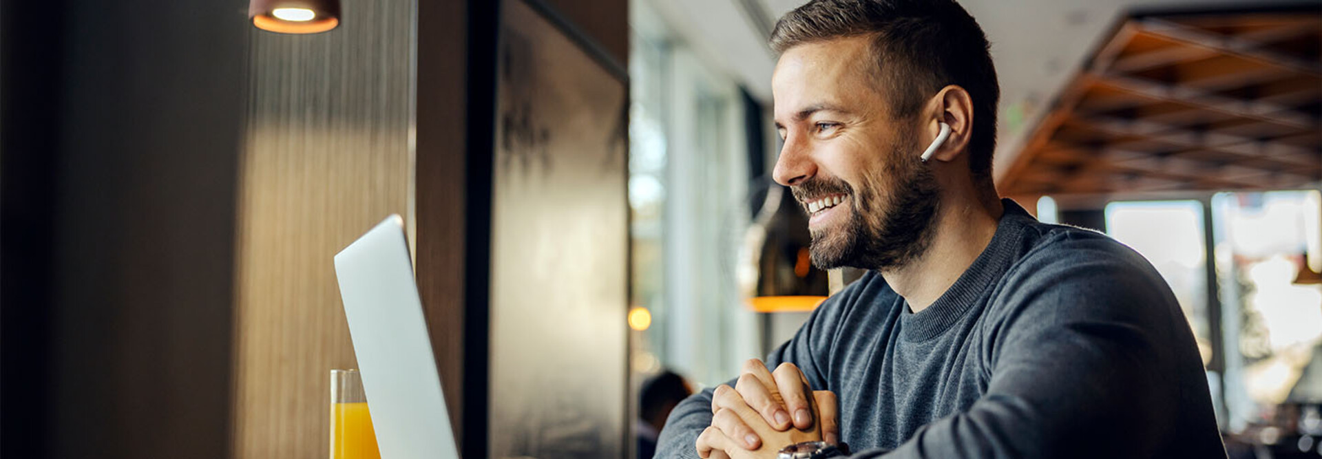 Freelancer sitting having conference call with client