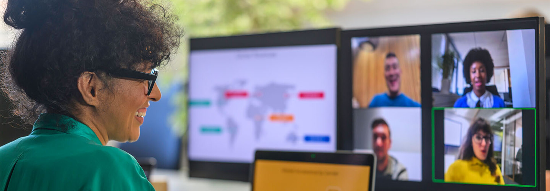 Businessperson with colleagues during conference call