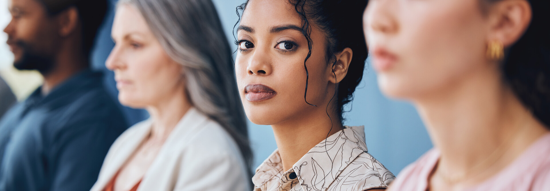 Person looking into camera during meeting