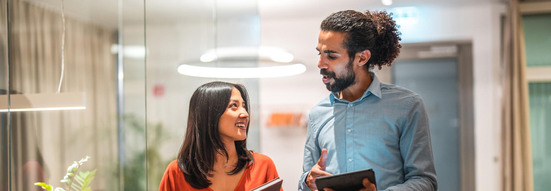 Colleagues talking at work 