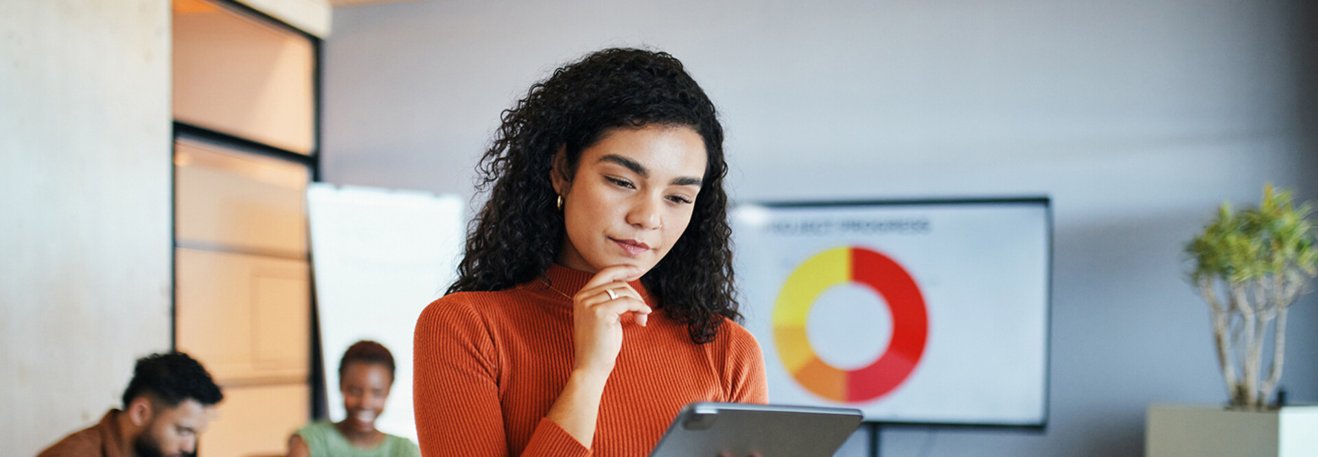 Person reviewing data via tablet