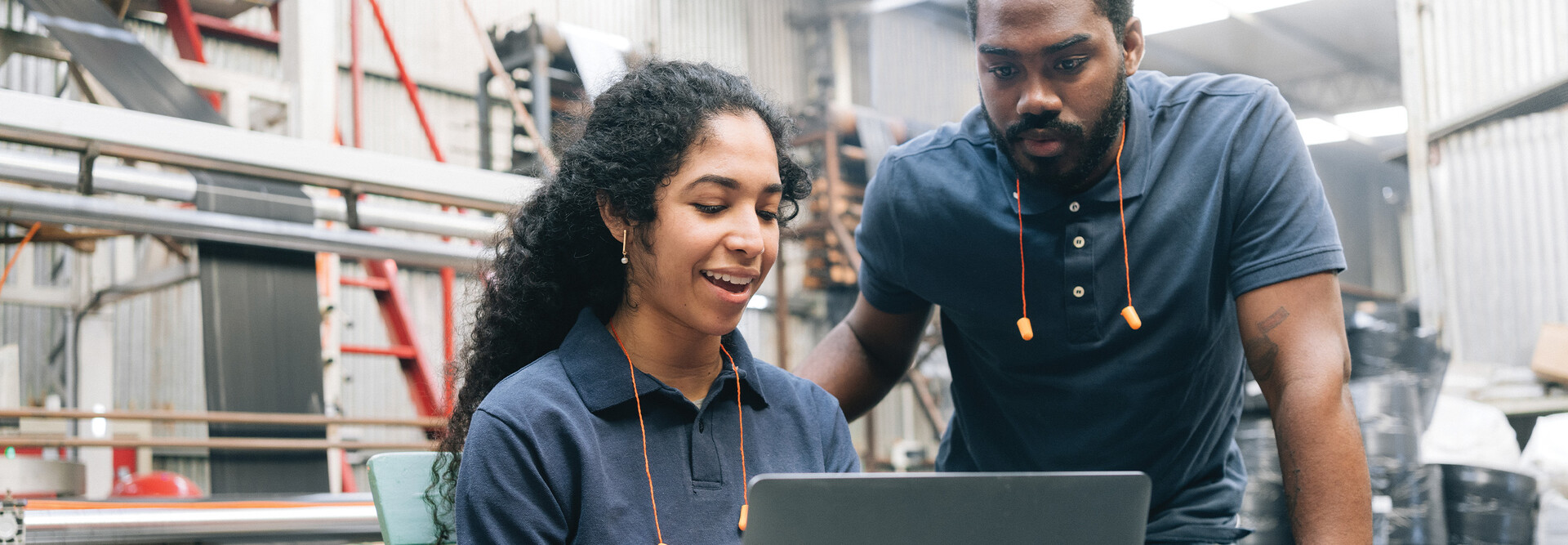 Workers in a manufacturing facility