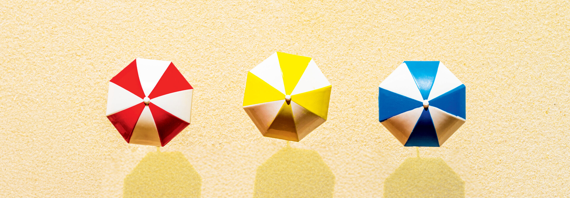 Three beach umbrellas to symbolize three tech tips