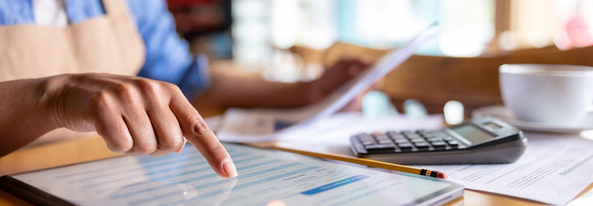 Person calculating business expenses