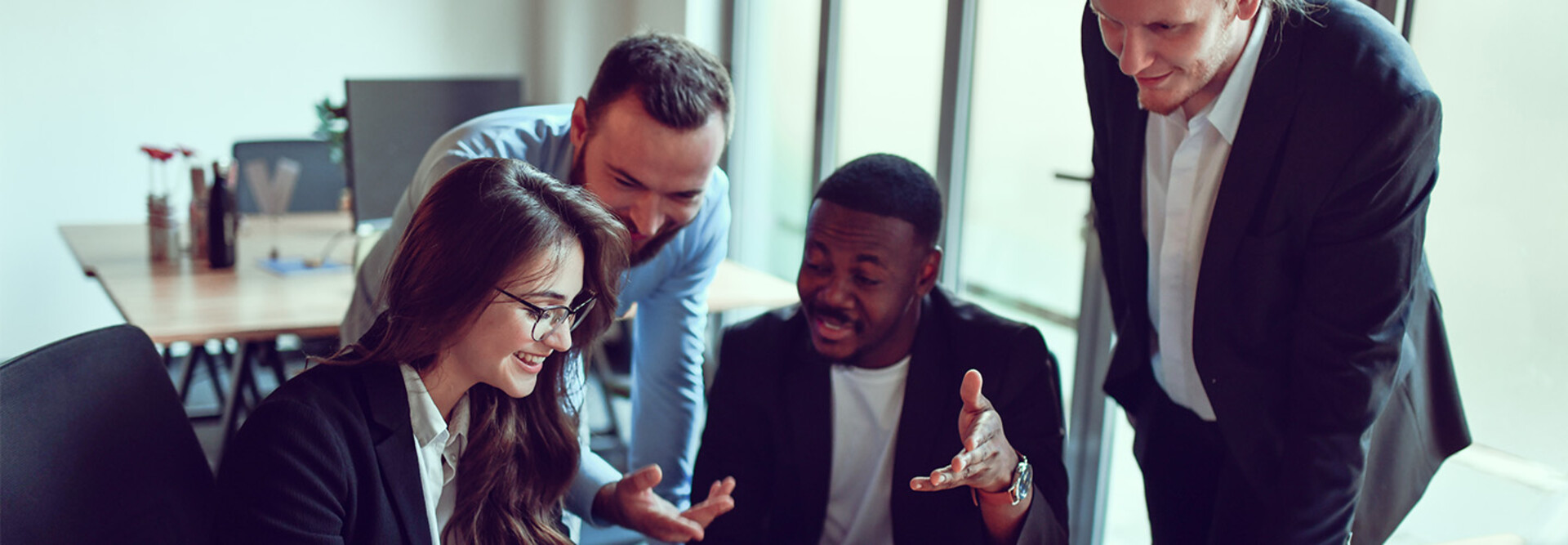 IT leaders in a modern workspace