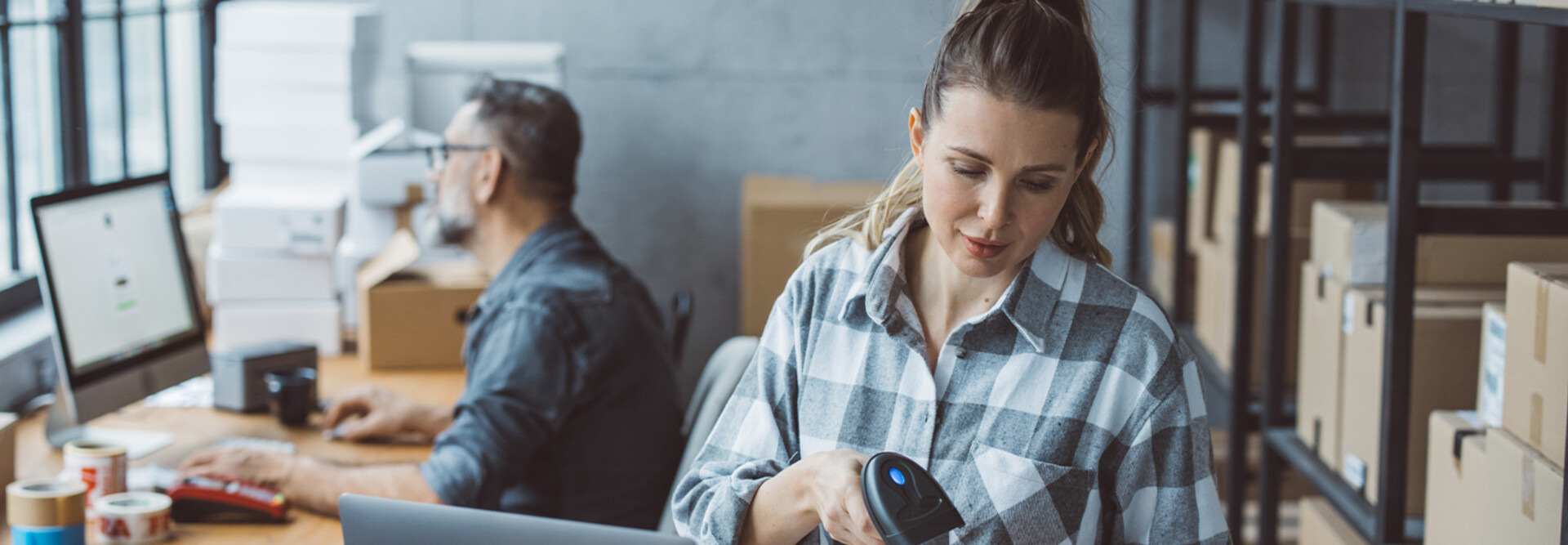Small business owners processing orders