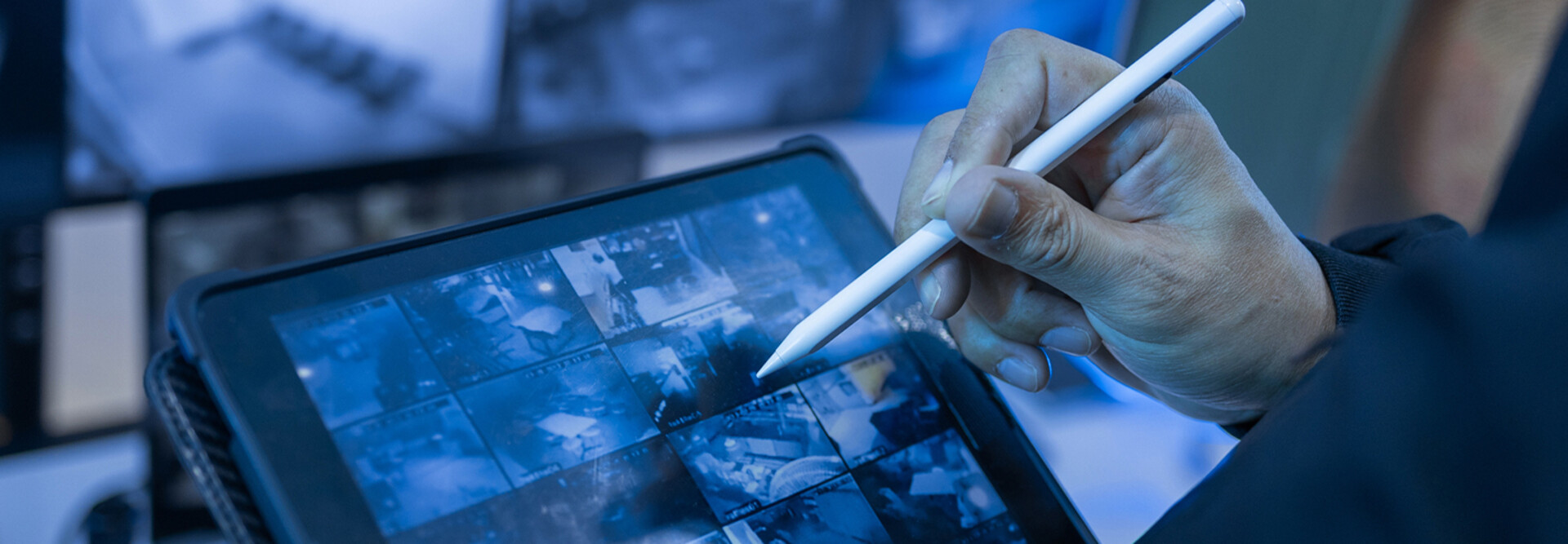Security guard using tablet