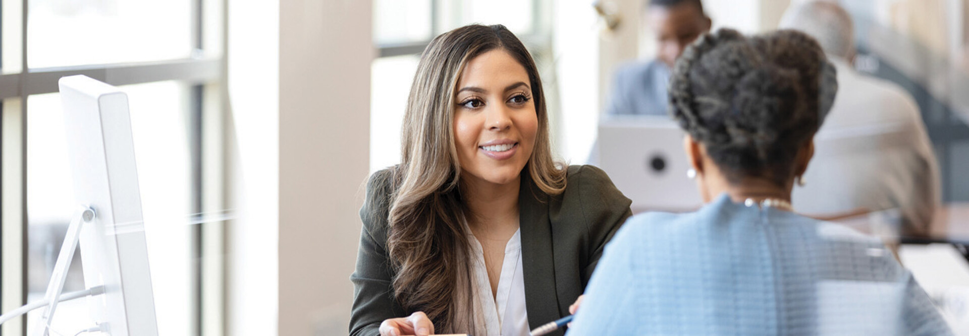 Banker working with customer