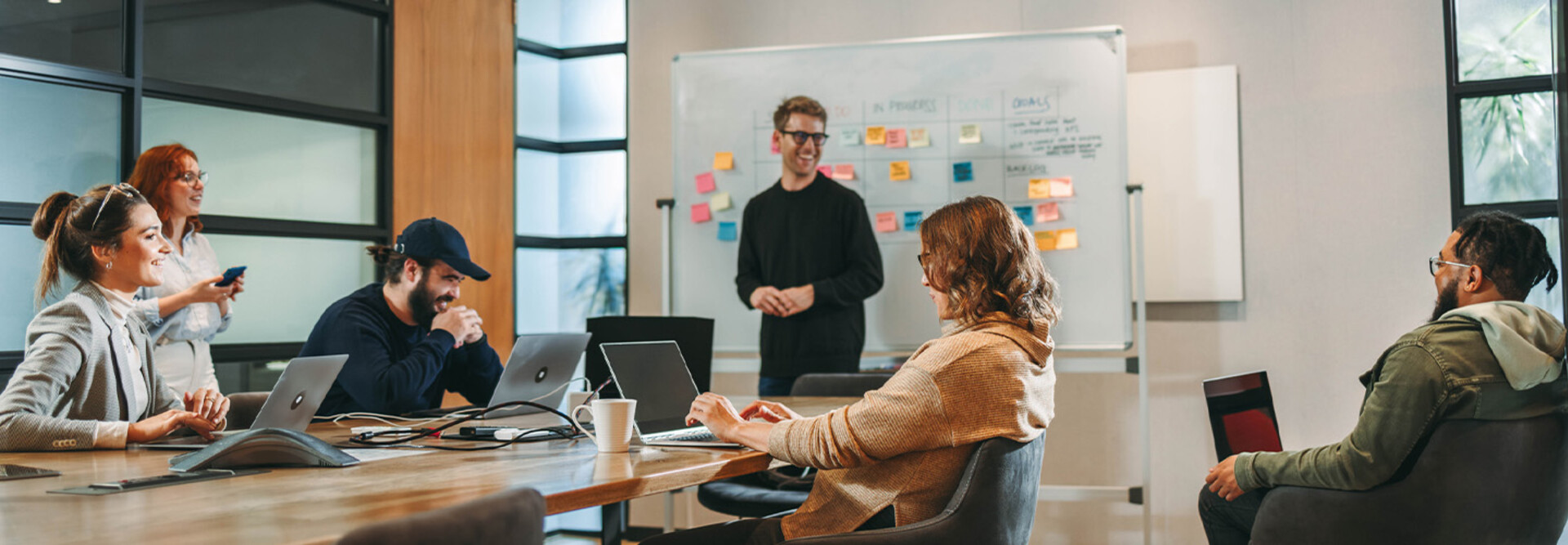 Person leading a meeting in the office
