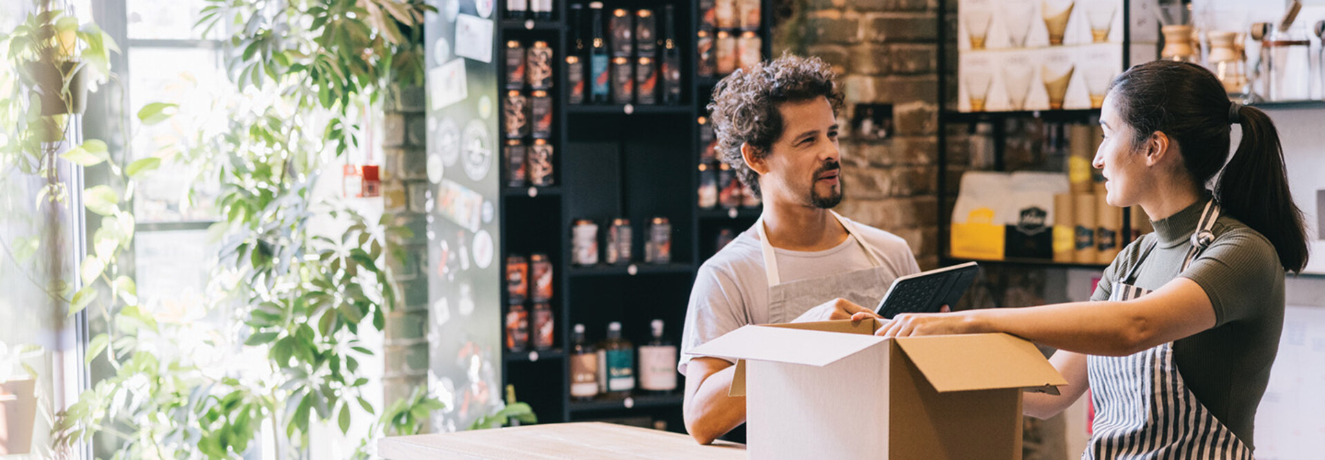 Small business owners working together in a shop