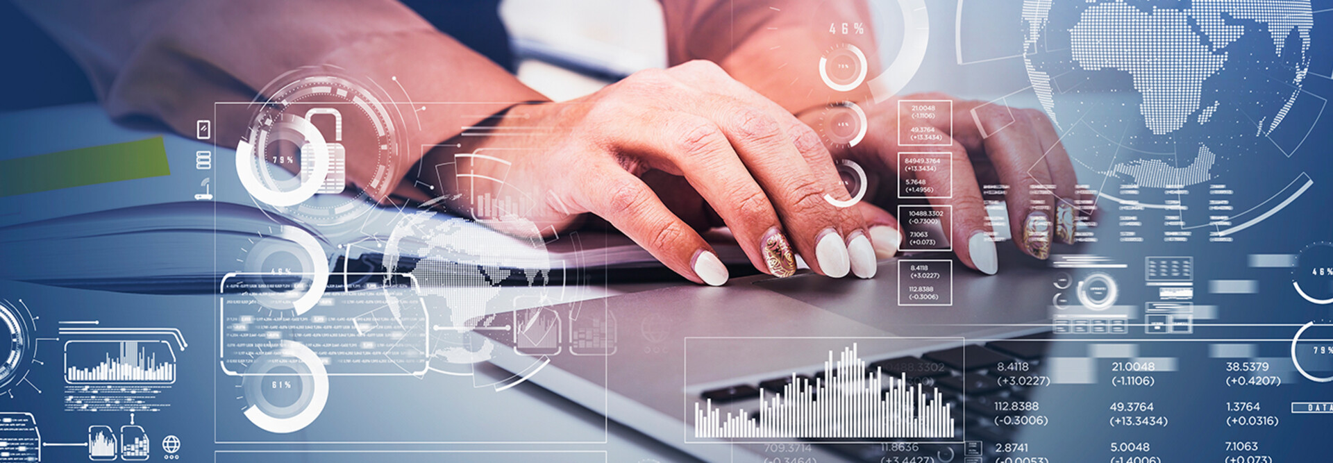 Business women typing on laptop.
