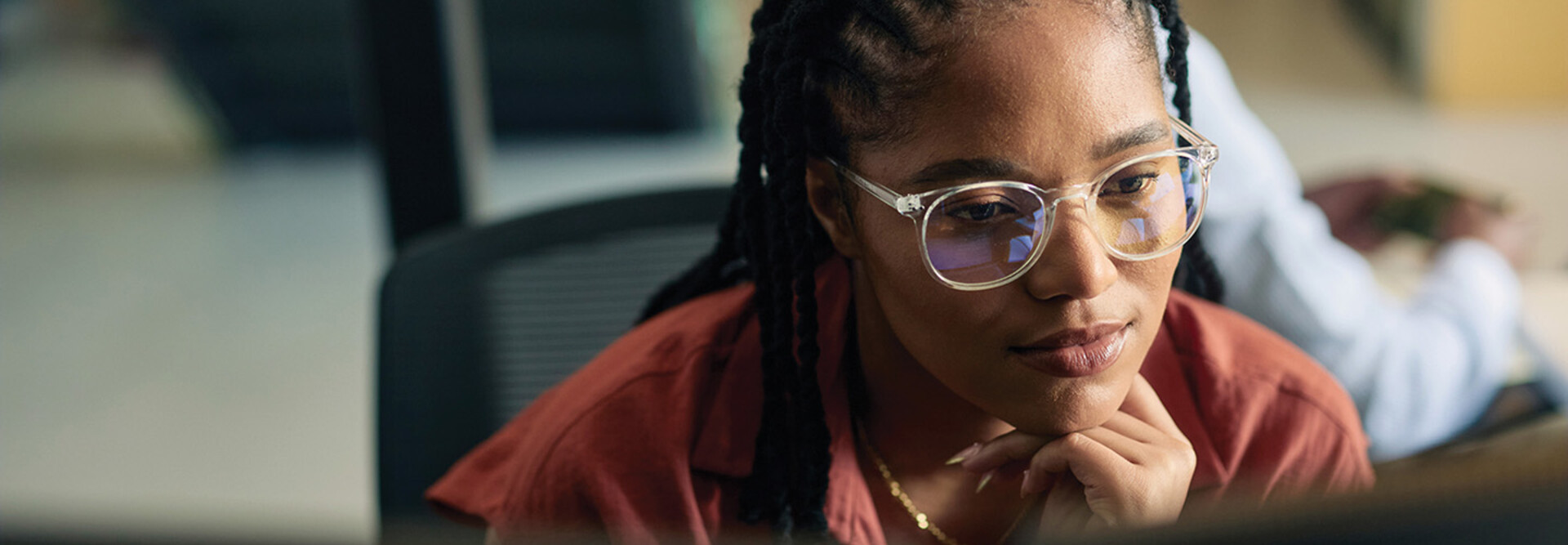 A business leader is coding