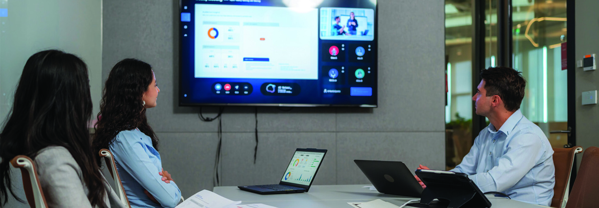 People reviewing screen