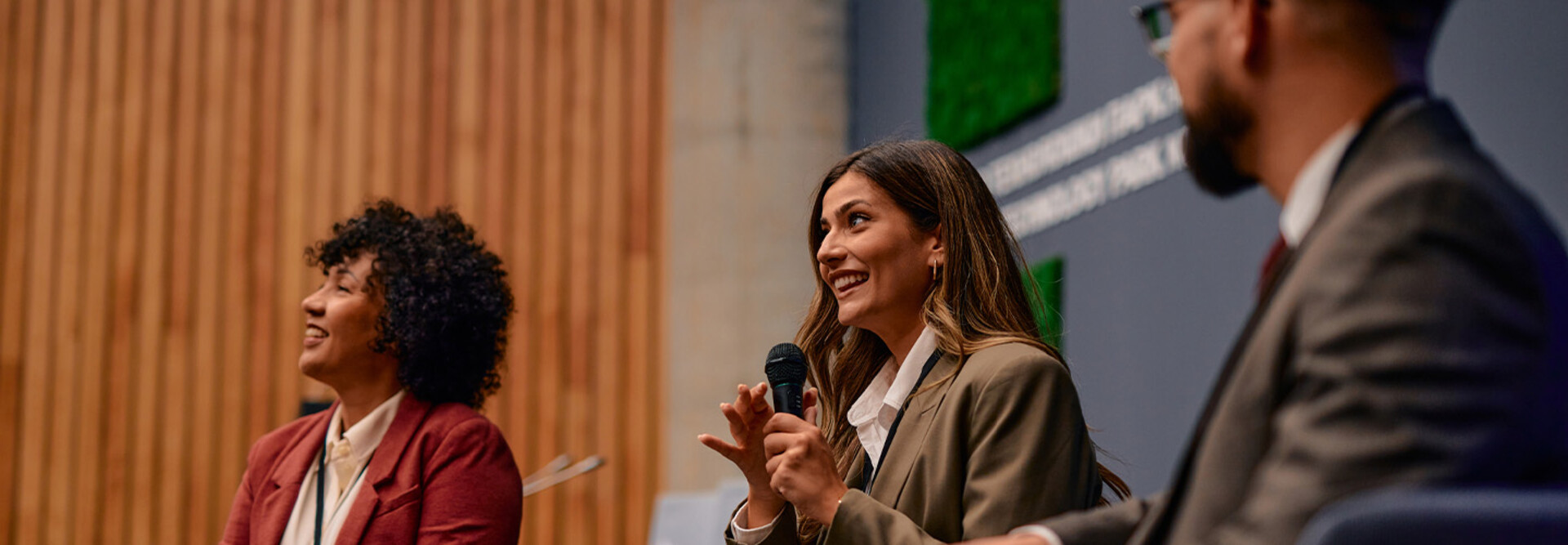 People speaking at conference