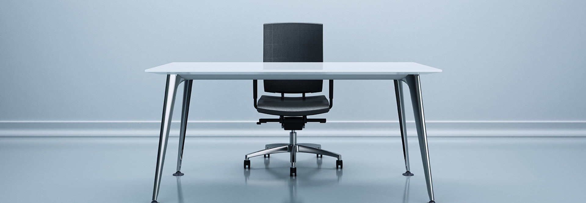 Empty chair at a desk 