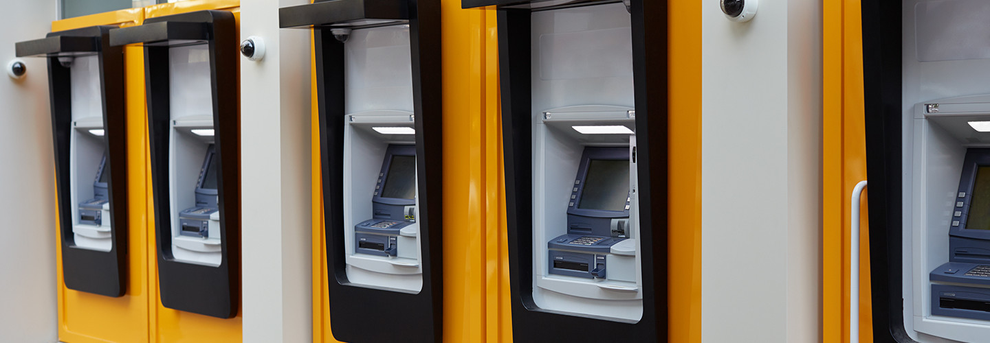 Bank of ATMs secured by video cameras