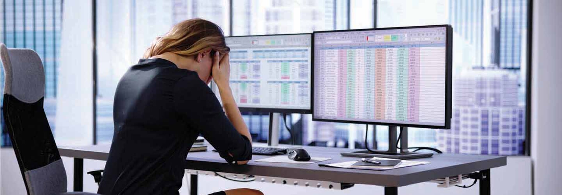 Person working on spreadsheet