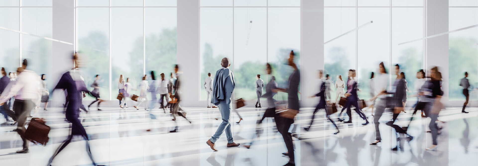 Business people walking through office building