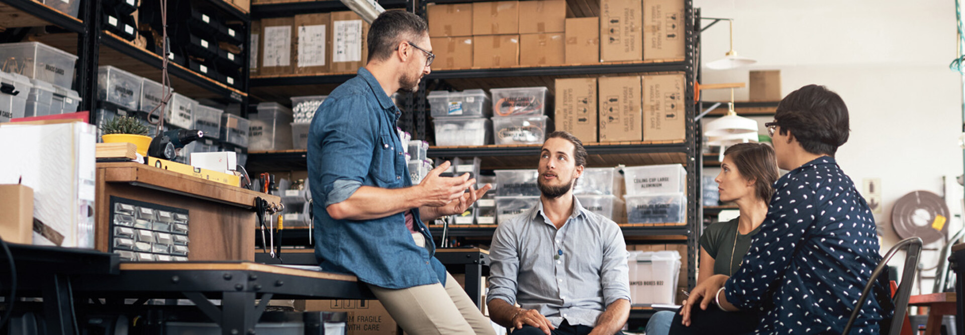 A group of colleagues having a discussion in a workshop