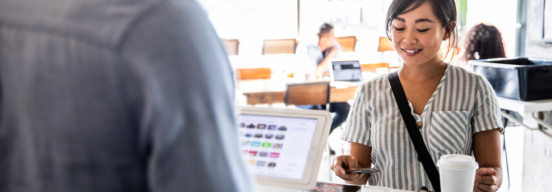 Person buying coffee
