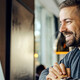 Freelancer sitting having conference call with client