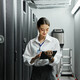 IT professional monitoring data center