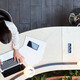 People working with Wi-Fi connected devices