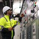 Engineers working in the main control room