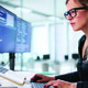 Employee reading computer screen