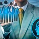 Manager lifting an illustration of people over AI