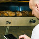 Baker using digital tablet