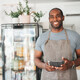 Small business owner with tablet