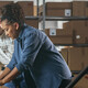 Two business owners in a warehouse