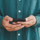 Businessman holding smartphone