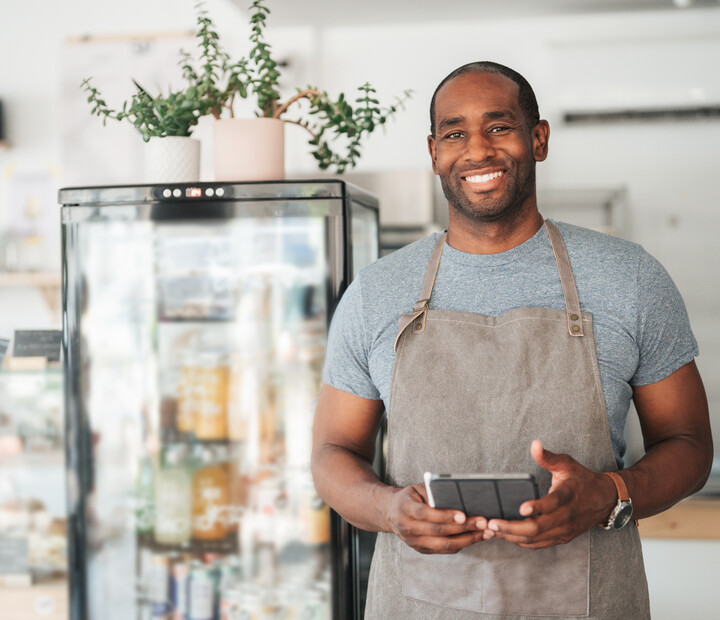 Small business owner with tablet