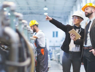 Quality inspectors team at factory