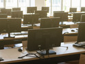 Classroom of many desktop computers.