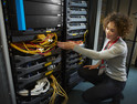 Woman works in a data center