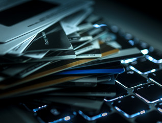 credit cards on computer keyboard